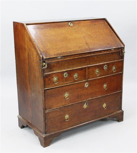 An 18th century oak bureau, W. 3ft. D. 1ft 9in. H. 3ft 5in.